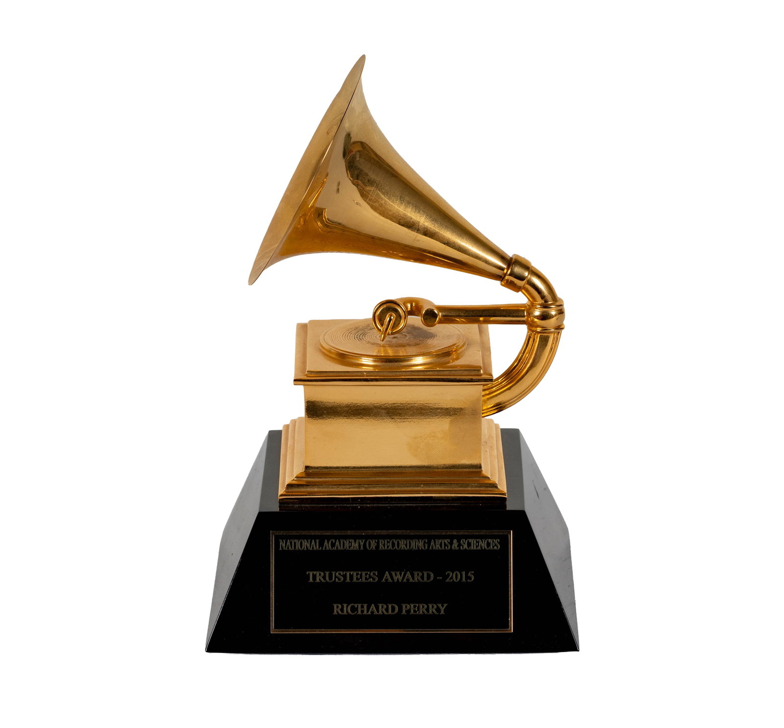 Richard Perry's 2015 Grammy Trustee Award: A gold-plated Grammy Trustees Award presented in 2015 to Richard Perry by the National Academy of Recording Arts & Sciences. The award features the iconic gramophone figure atop a tiered base, mounted