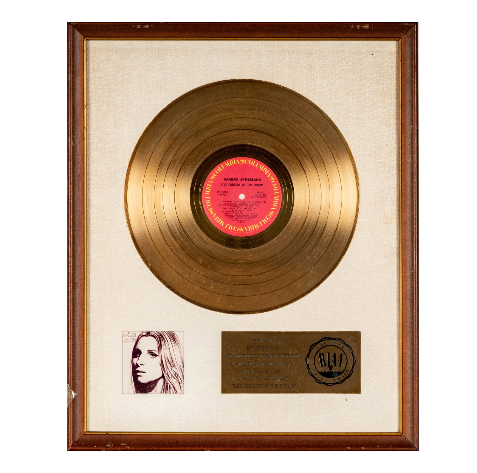 Richard Perry's Gold Record for Barbara Streisand Live Concert at the Forum: This RIAA certified gold record was presented to Richard Perry to commemorate the sale of more than one million dollars worth of Barbra Streisand's "Live Concert at the Forum" Columbia Records long-pl