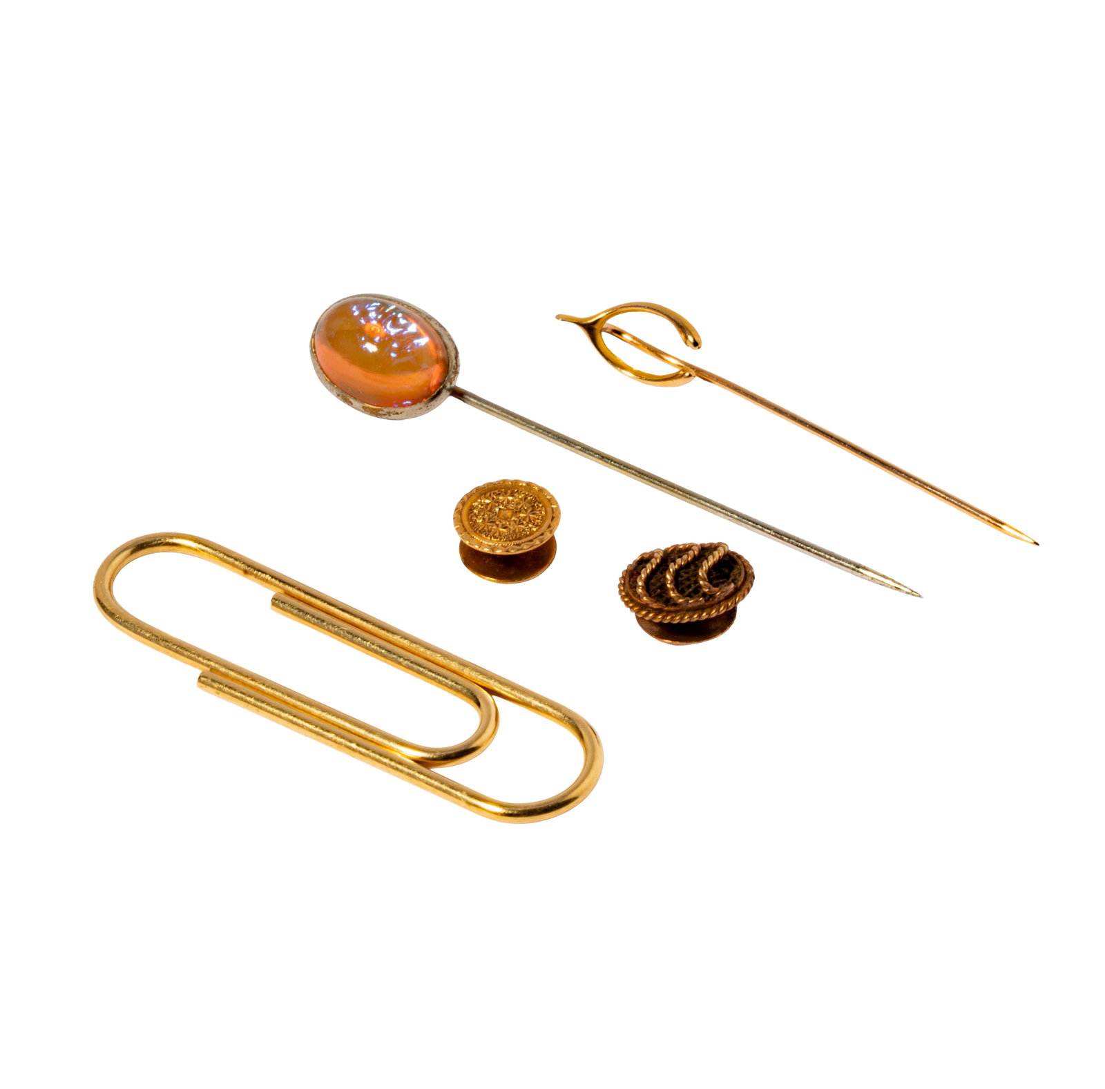 Small Group Of Gold and Silver Pins: Including one 14 karat yellow gold paperclip and one wishbone stick-pin weighing 6.6 grams, two 18 karat yellow gold button studs weighing 2.1 grams together; and one gold-tone imitation opal stick