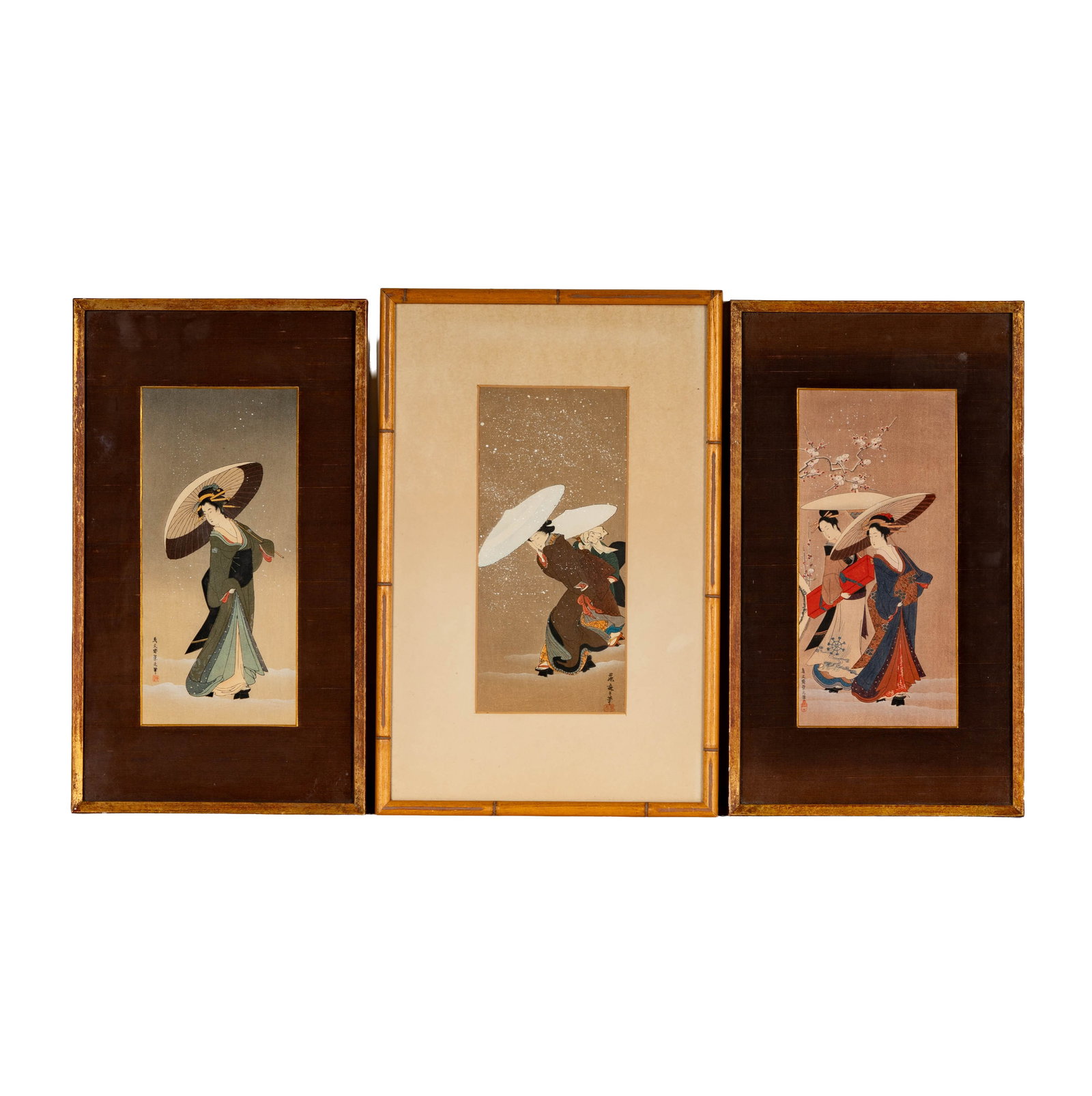 Three Japanese Woodblocks of Geishas: each with signatures and seals, the matching frame measurement: 15 1/2 x 8 3/4 in.