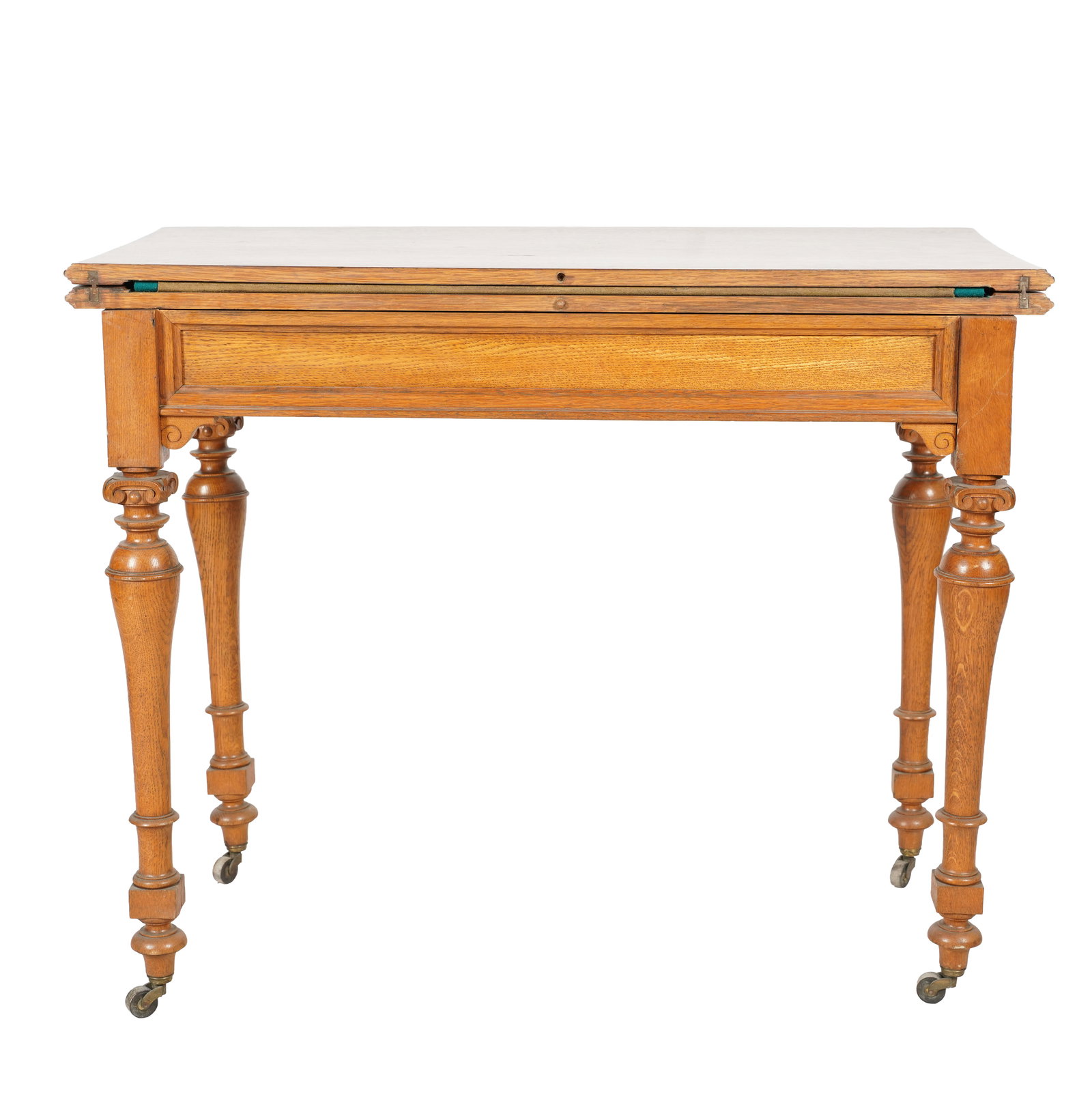 Antique Oak Flip Top Table: with a green felt top, fiited interior, and casters, closed: 29 1/2 x 36 1/2 x 18 in.