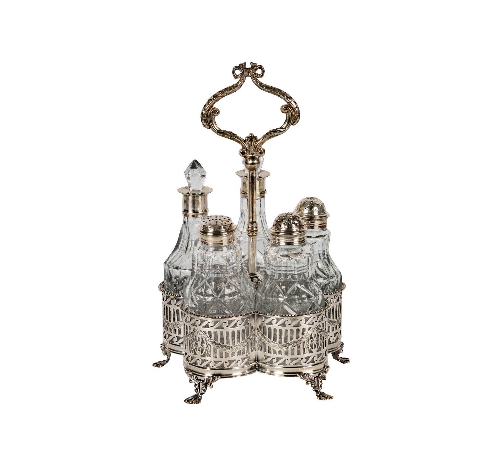 A George III Sterling Cruet Set: Fenton, Creswick and Co., Sheffield, 1777 (marked to underside of stand), with five metal-mounted cut glass bottles (the mounts unmarked); the stand: 396 grams, 9 1/2 x 5 1/2 5 1/2 in.