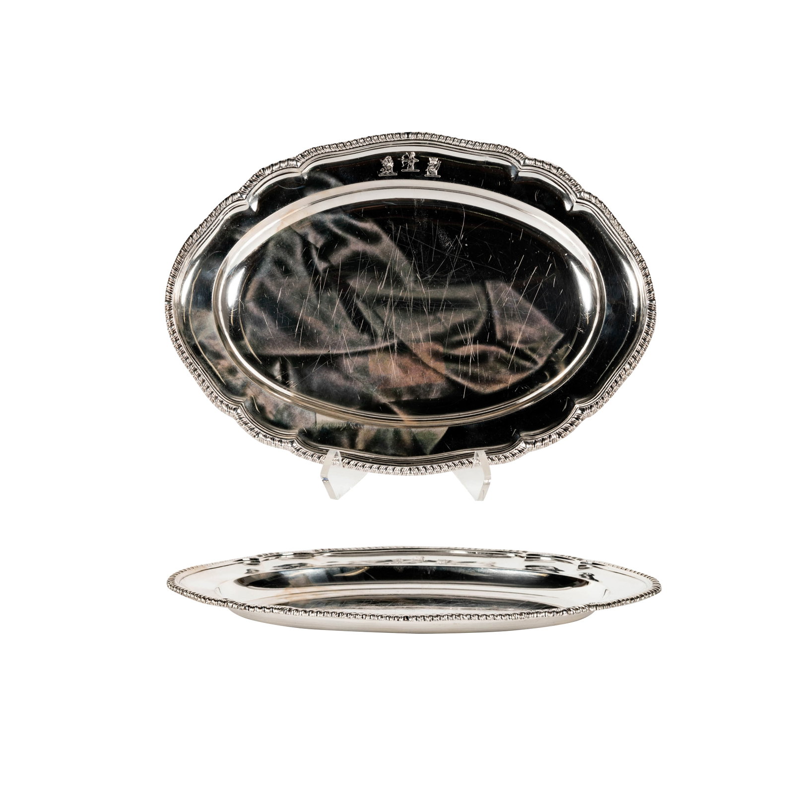 A Paul Storr Sterling Oval Platter: Paul Storr, London, 1801 (marked to underside of rim), engraved to rim with heraldic devices, approximately 1,208 grams, 15 x 10 1/2 in., private collection , Montecito, CA.