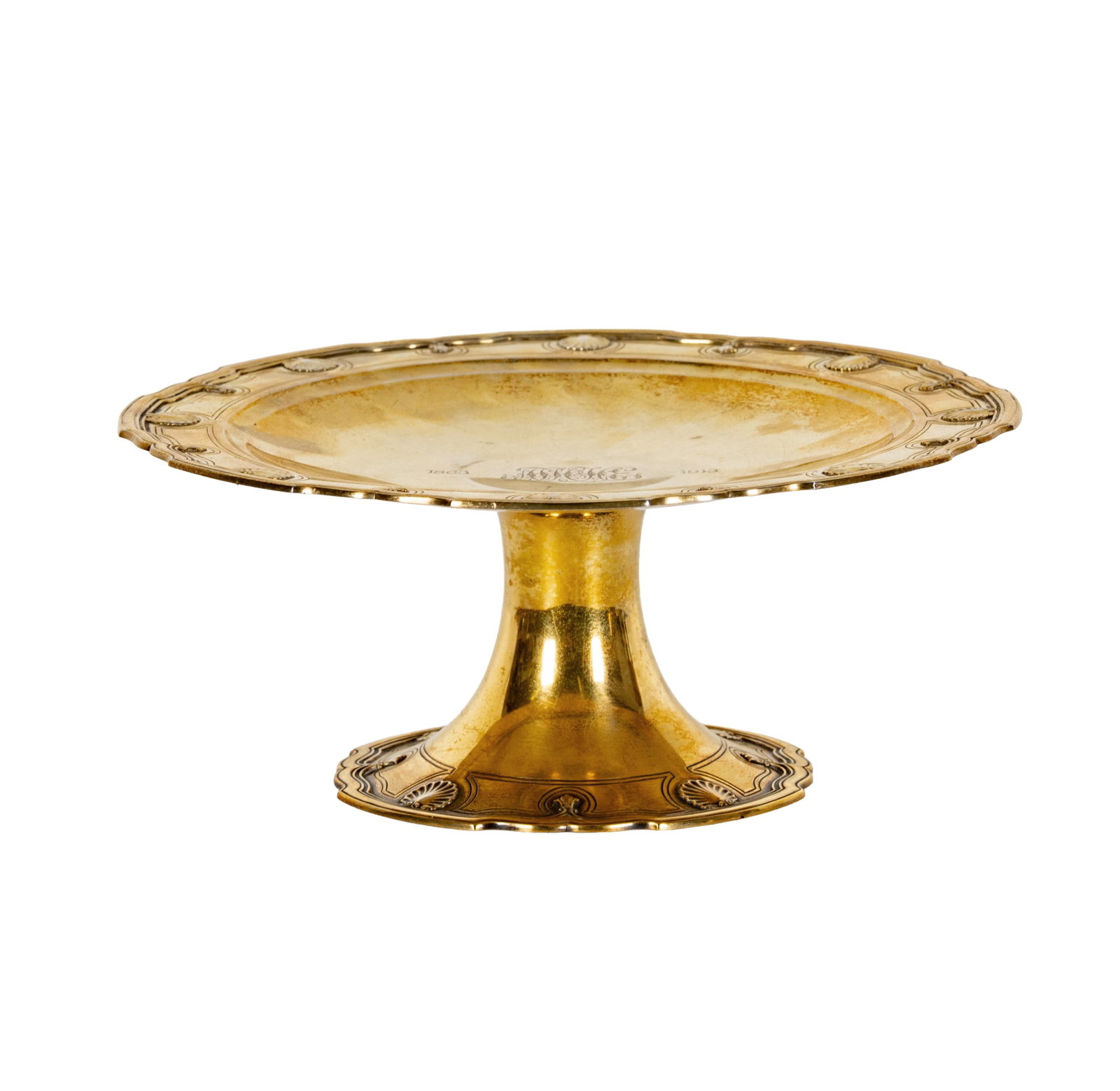 A Tiffany and Co. Sterling Tazza: New York, NY, Directorship of John C. Moore II, 1907-1947, pattern no. 8025 (marked to underside), engraved to top "1863-1913" and with monogram, approximately 853 grams, 4 1/2 x 10 3/4 in.