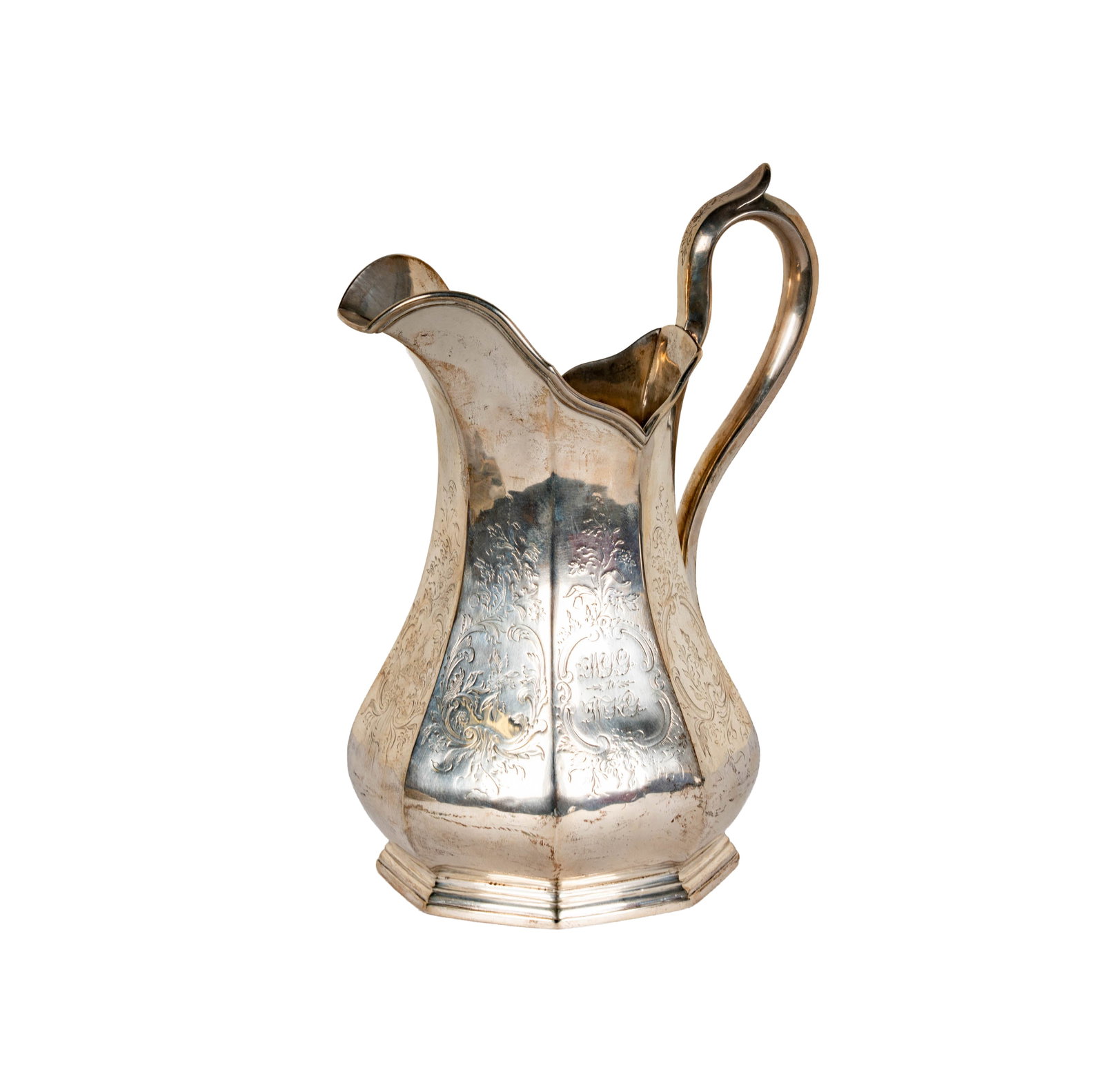 An American Coin Silver Pitcher: Lows, Ball and Company, Boston, c. 1884; engraved with inscription "WGG to WKG" to body and "Silver Wedding / May 3rd 1884" to underside, marked "Lows, Ball & Co." to underside, approximately 787 gram