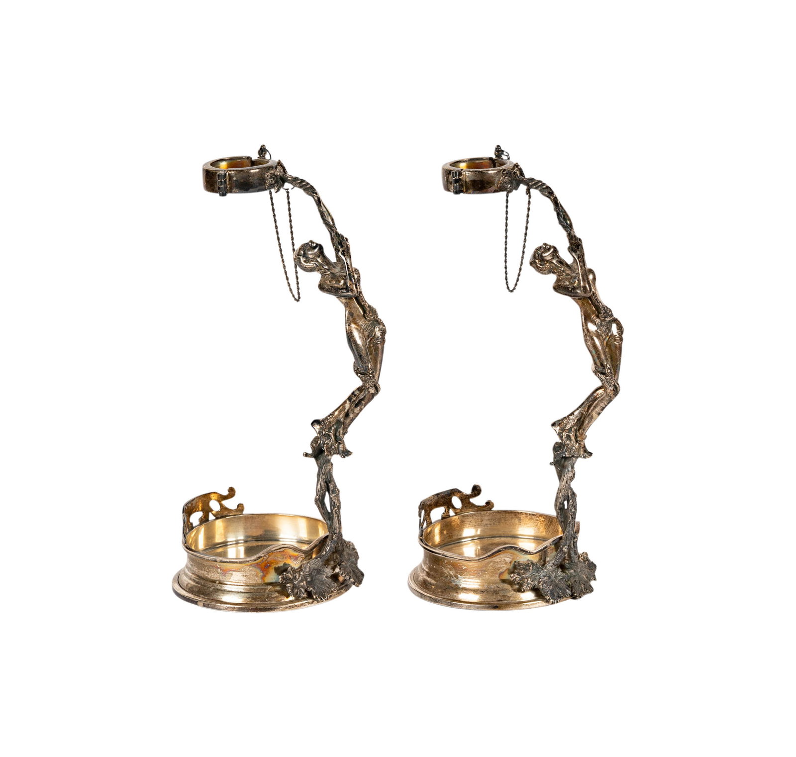 A Pair of Sterling FIgural Bottle Holders: approximately 1,233 grams total, each 10 1/2 in. high