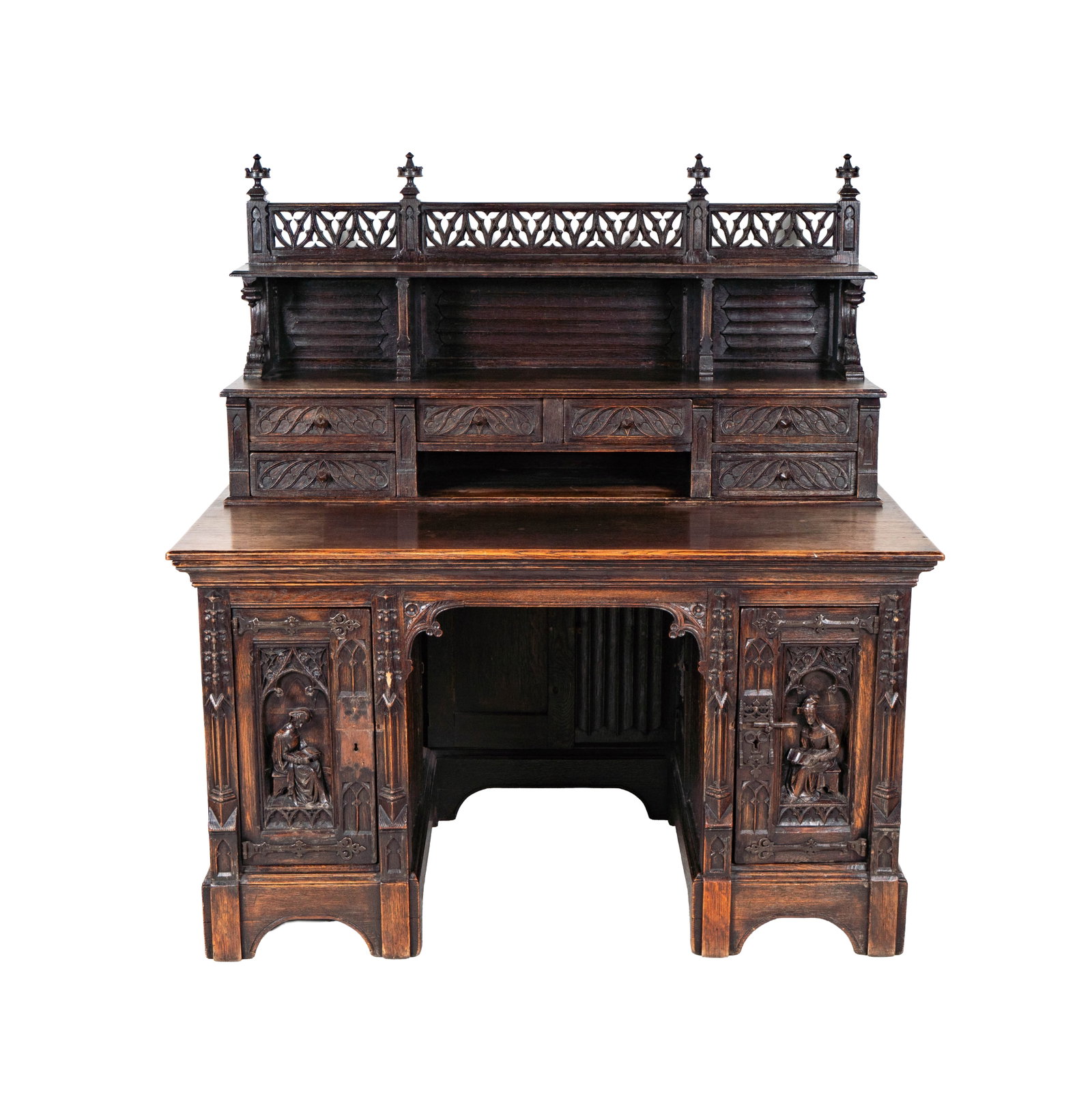A Gothic Oak Kneehole Desk: 31 x 54 1/2 x 32 1/2 in.