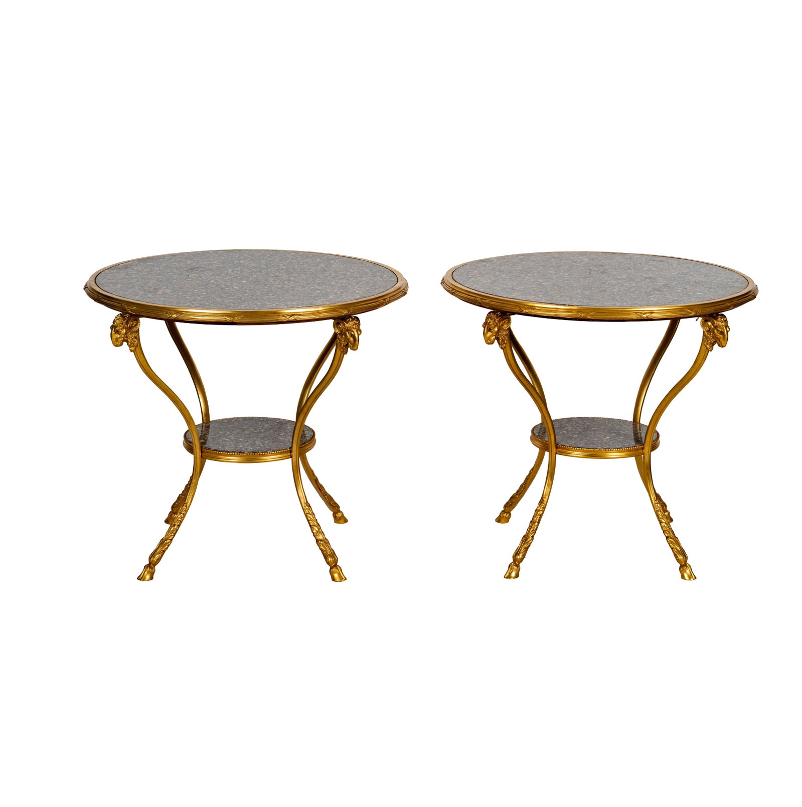 A Pair of Neoclassical-Style Dore Bronze Tiered Tables: wth ram's head motif and granite inserts, 27 x 30 in.