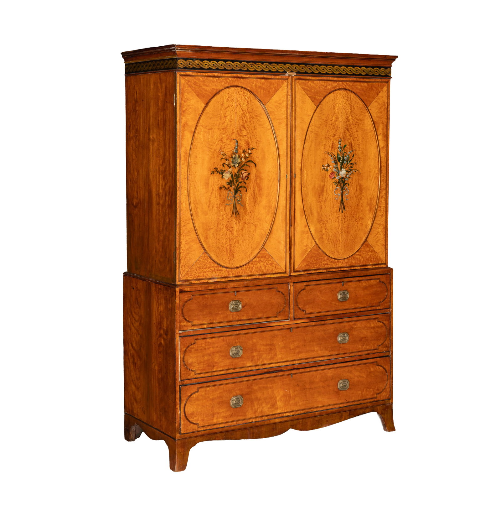 An English Edwardian Painted Satinwood Cabinet: in two parts, 81 3/4 x 54 x 23 3/4 in.