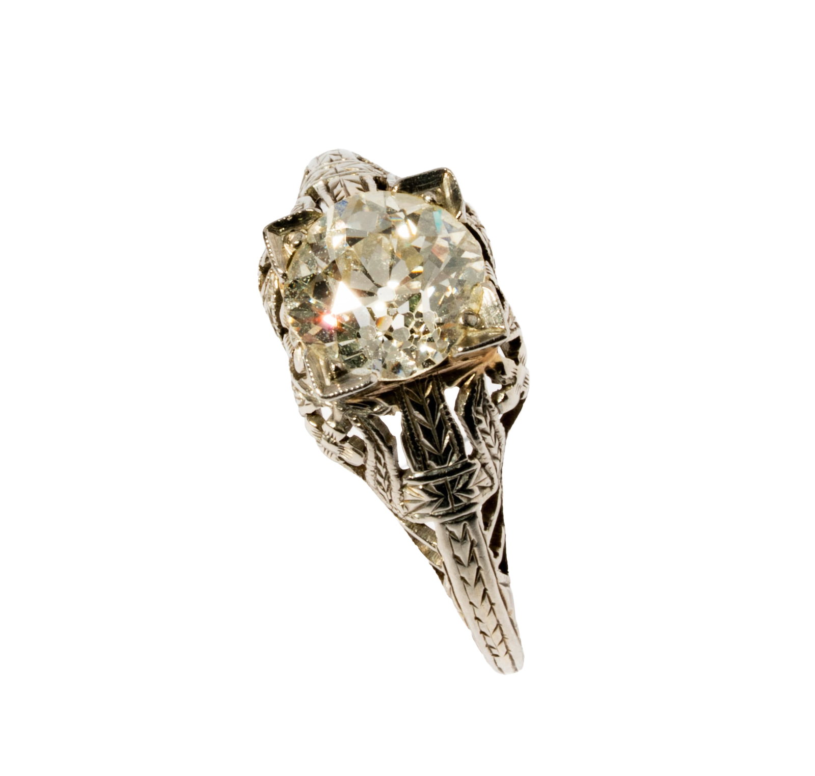 18 Karat White Gold Diamond Ring: Including one 18 karat white gold diamond ring, centering one European-cut diamond [I-K/VVS2-VS] weighing approximately 1.65 carats, size: 8, weighing approximately 2.7 grams;