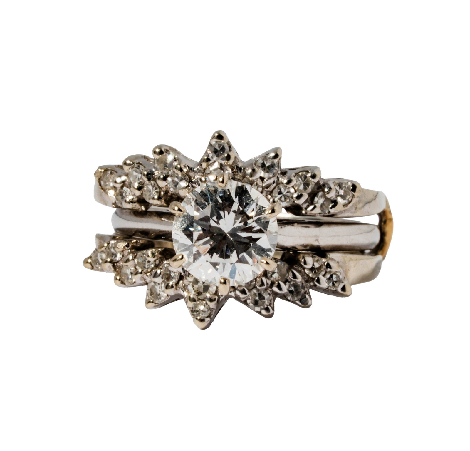 14 Karat White Gold and Diamond Wedding Set: Including one 14 karat white gold diamond wedding set, with one solitaire ring set with one diamond [G-H/VS-2], weighing approximately 1.25 carats, size: 5-3/4, also with one white gold and diamond ri