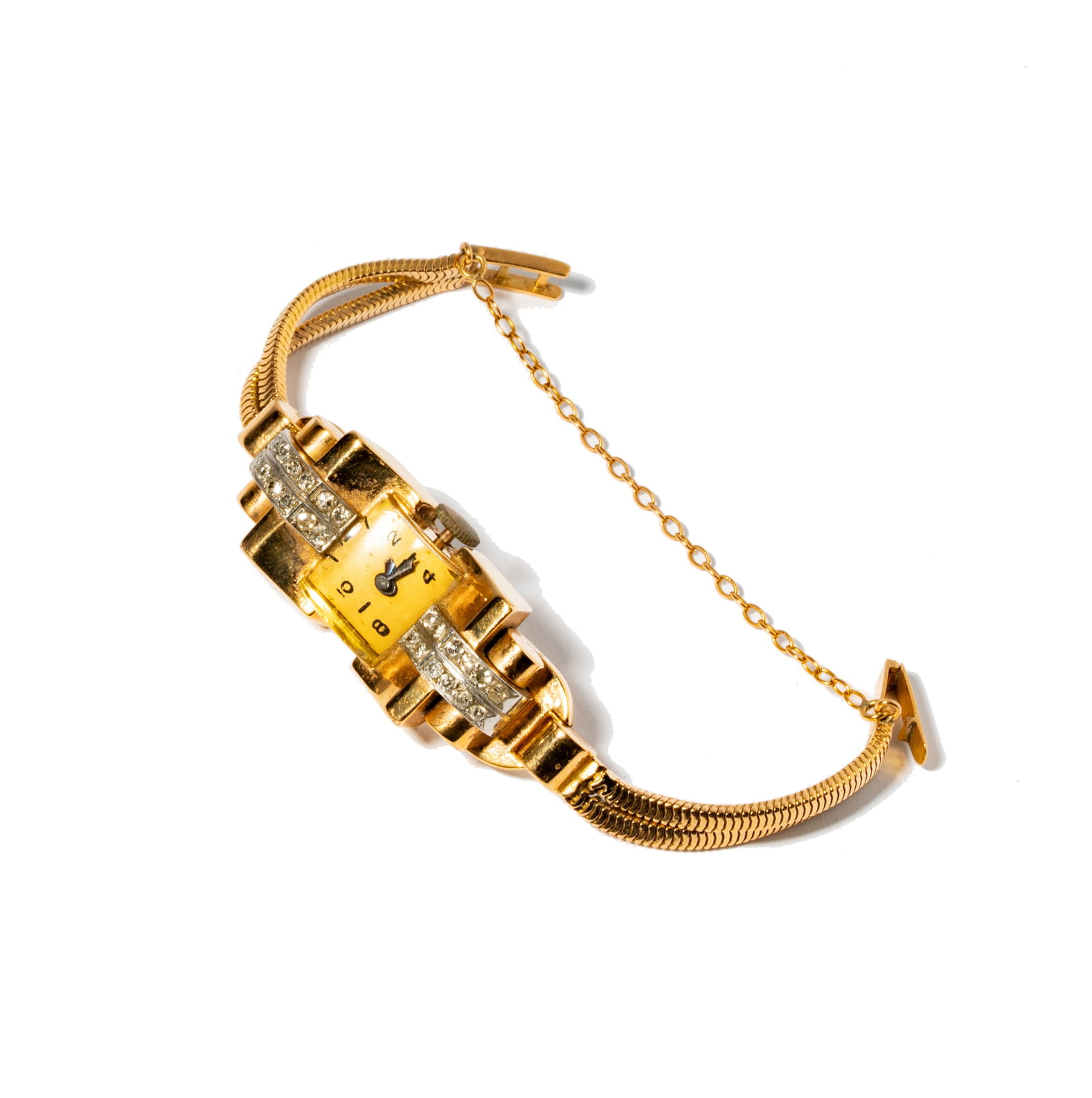 French, Retro Era 18 Karat Yellow Gold and Diamond Watch: Including one 18 karat yellow gold and diamond watch set with 24 small round diamonds [I-K/SI3] weighing approximately 0.70 carats; measuring 5-3/4 inches long; weighing 39.7 without movement, weighin