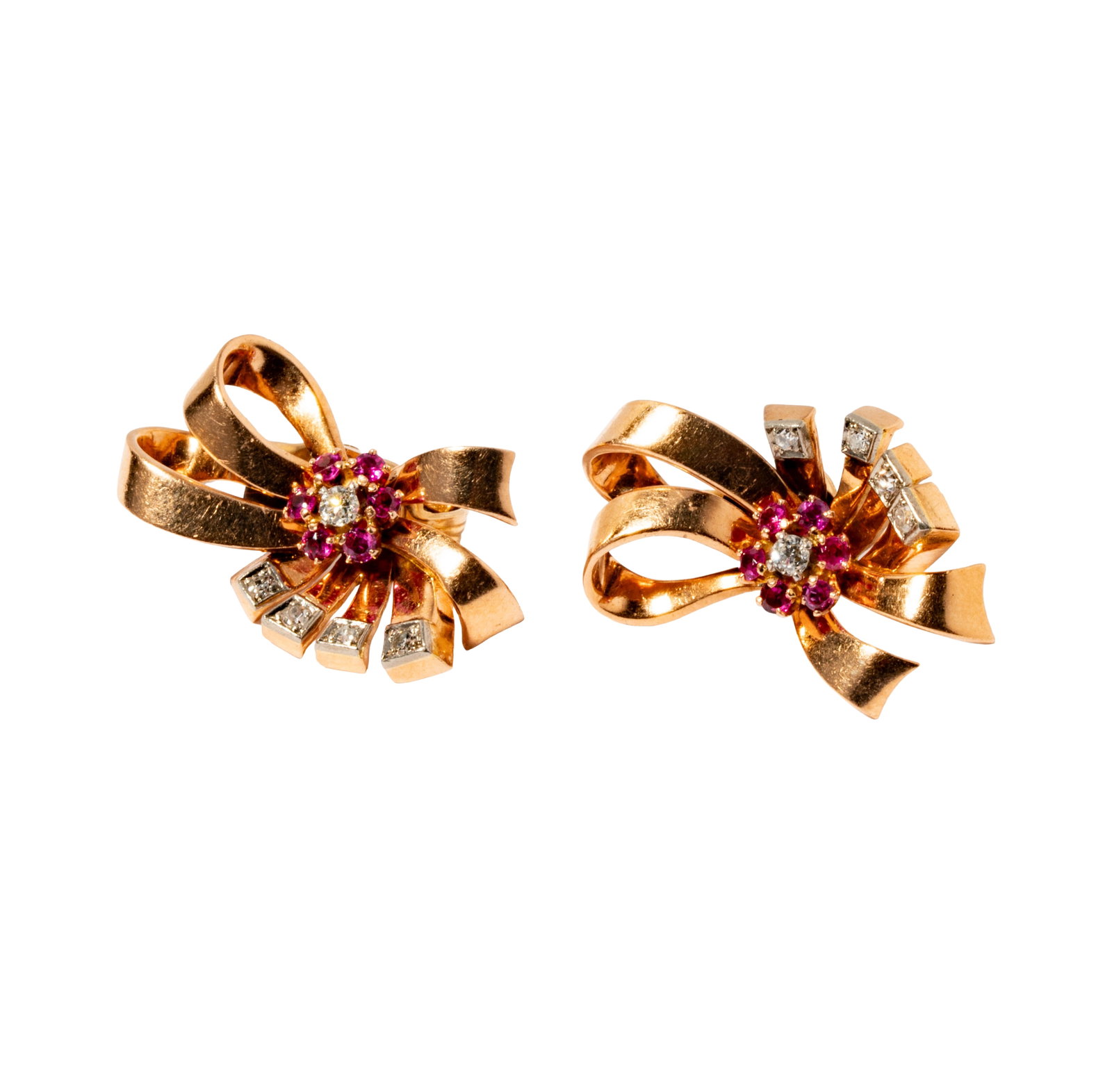Tiffany and Co. 14 Karat Rose Gold Diamond and Ruby Earrings: Including one pair of 14 karat white and rose gold earrings set with diamonds and rubies, with 10 small round diamonds weighing approximately 0.15 carats and 12 small round rubies weighing approximate