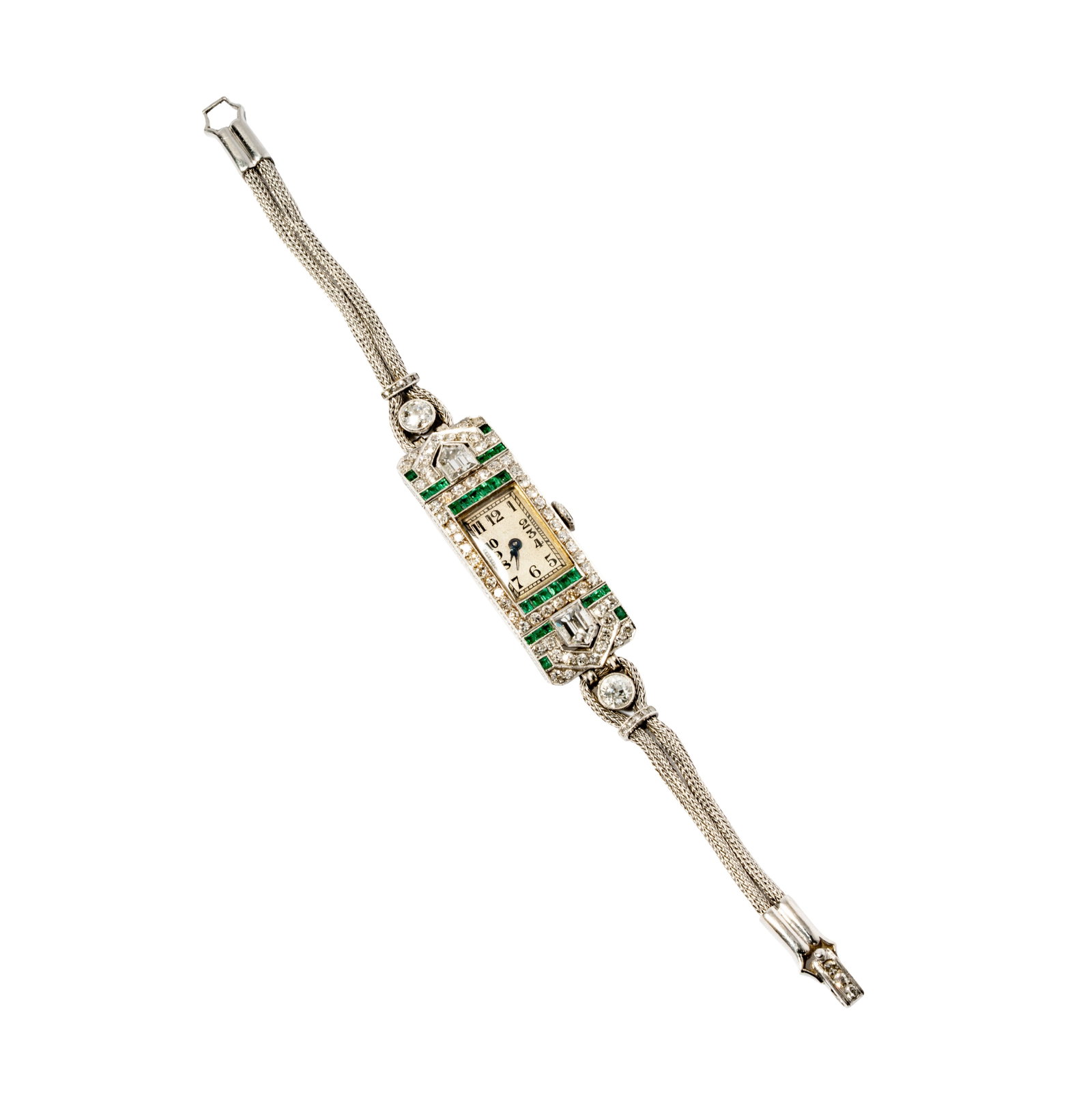 Vacheron Constantin, Art Deco, Platinum, Diamond and Emerald Watch: Including one Art Deco Vacheron Constatin, platinum, diamond and emerald watch, set with 81 mixed-cut diamonds [G-J/VVS-VS] weighing approximately 2.85 carats, and accented with 28 small square step-c