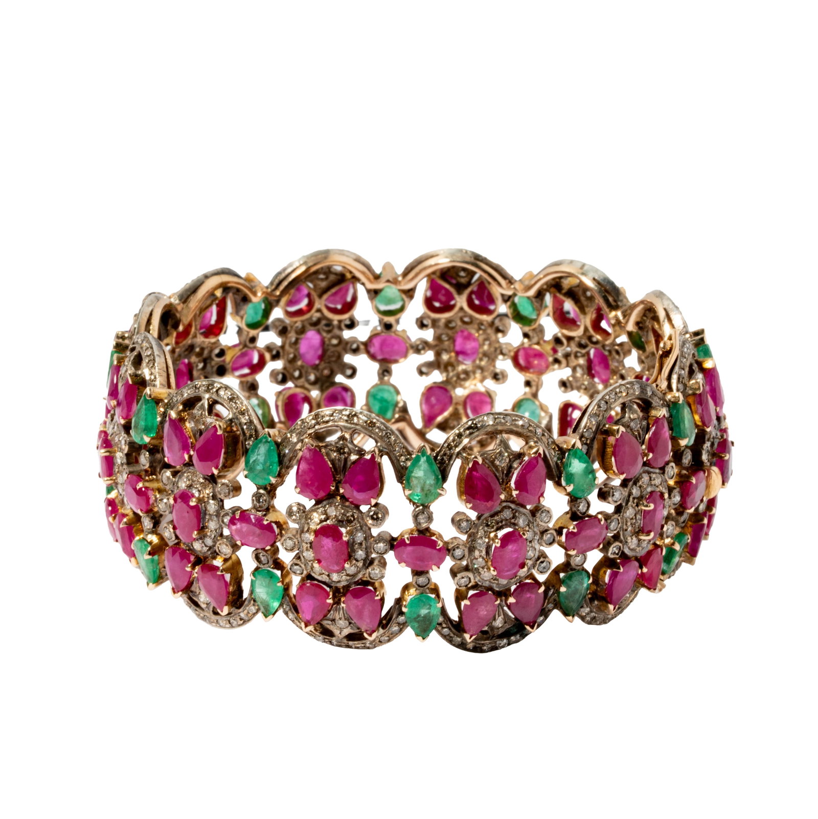 Silver-Topped, Yellow Gold, Emerald, Ruby and Diamond Bracelet: Including one silver-topped yellow gold, diamond, ruby and emerald bangle, set with 454 small round diamonds weighing approximately 3.30 carats total, 71 mixed-cut rubies weighing approximately 18.25 