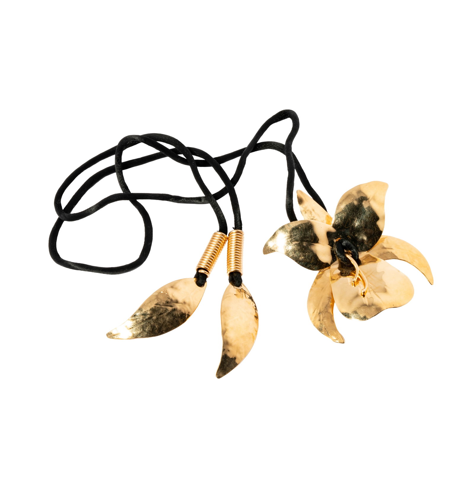 14 Karat Yellow Gold Flower Necklace: Including one 14 karat yellow gold flower and silk cord necklace measuring 36-1/8inches long, and weighing 40.4 grams,