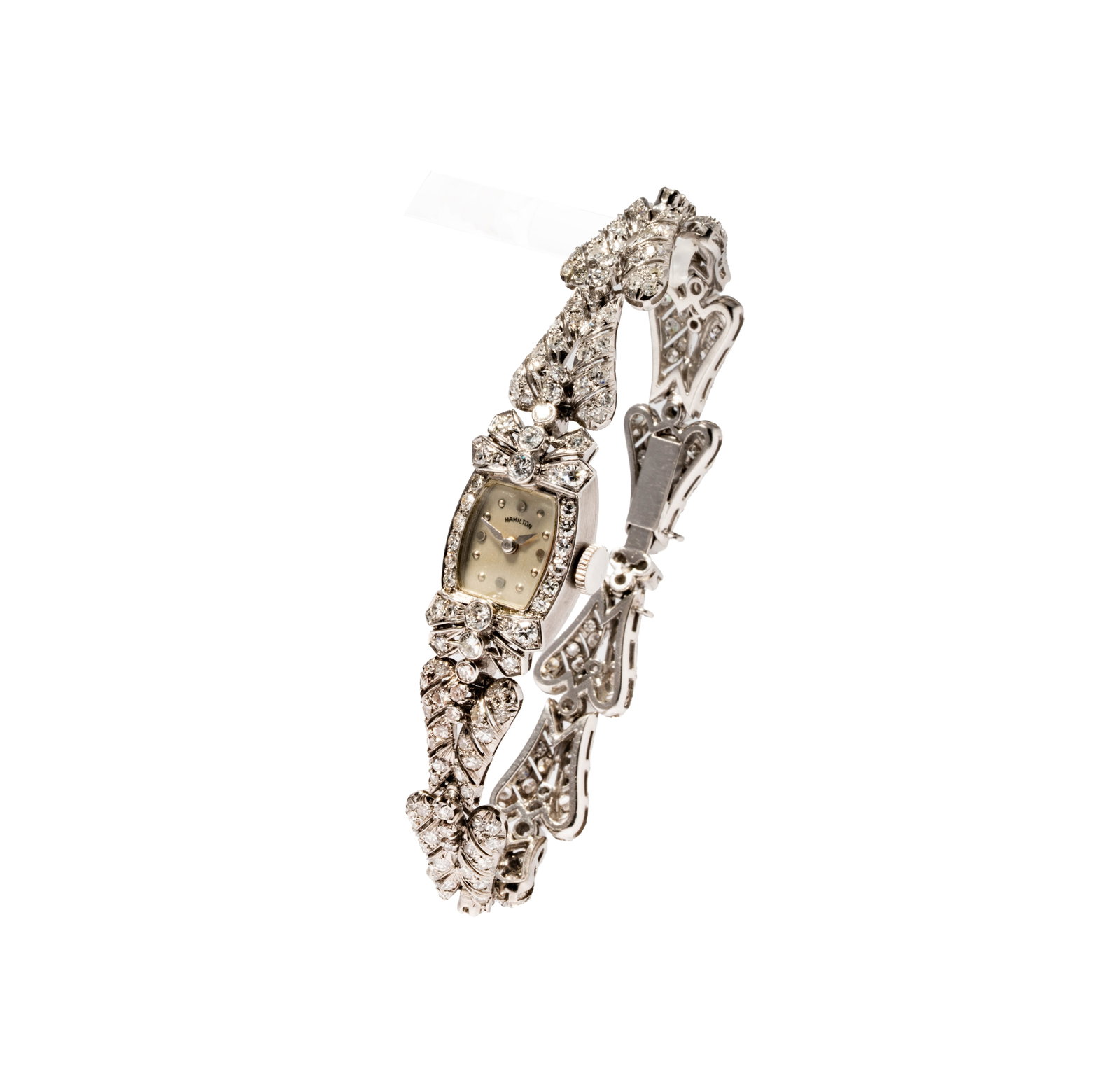 Hamilton, Platinum and Diamond Watch: Including one Hamilton platinum diamond watch, watch set with 242 small round single-cut diamonds [H-J/VS-SI] weighing approximately 4.25 carats; measuring 6-1/2 inches long, weighing 35 grams;