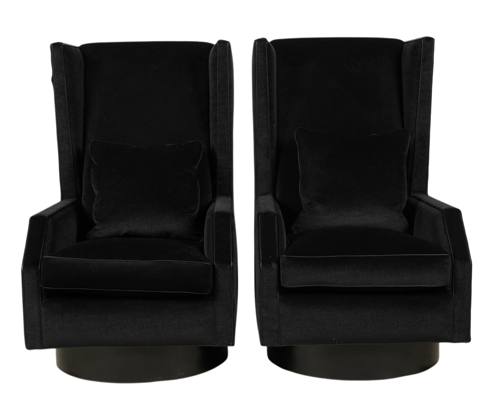 A Pair of Lawson-Fenning Wing Back Lounge Chairs: wood swivel base with fabric upgraded by Adam Bram Straus, each with a throw pillow, 44 1/2 x 26 1/2 x 29 in., seat height: 17 in.
