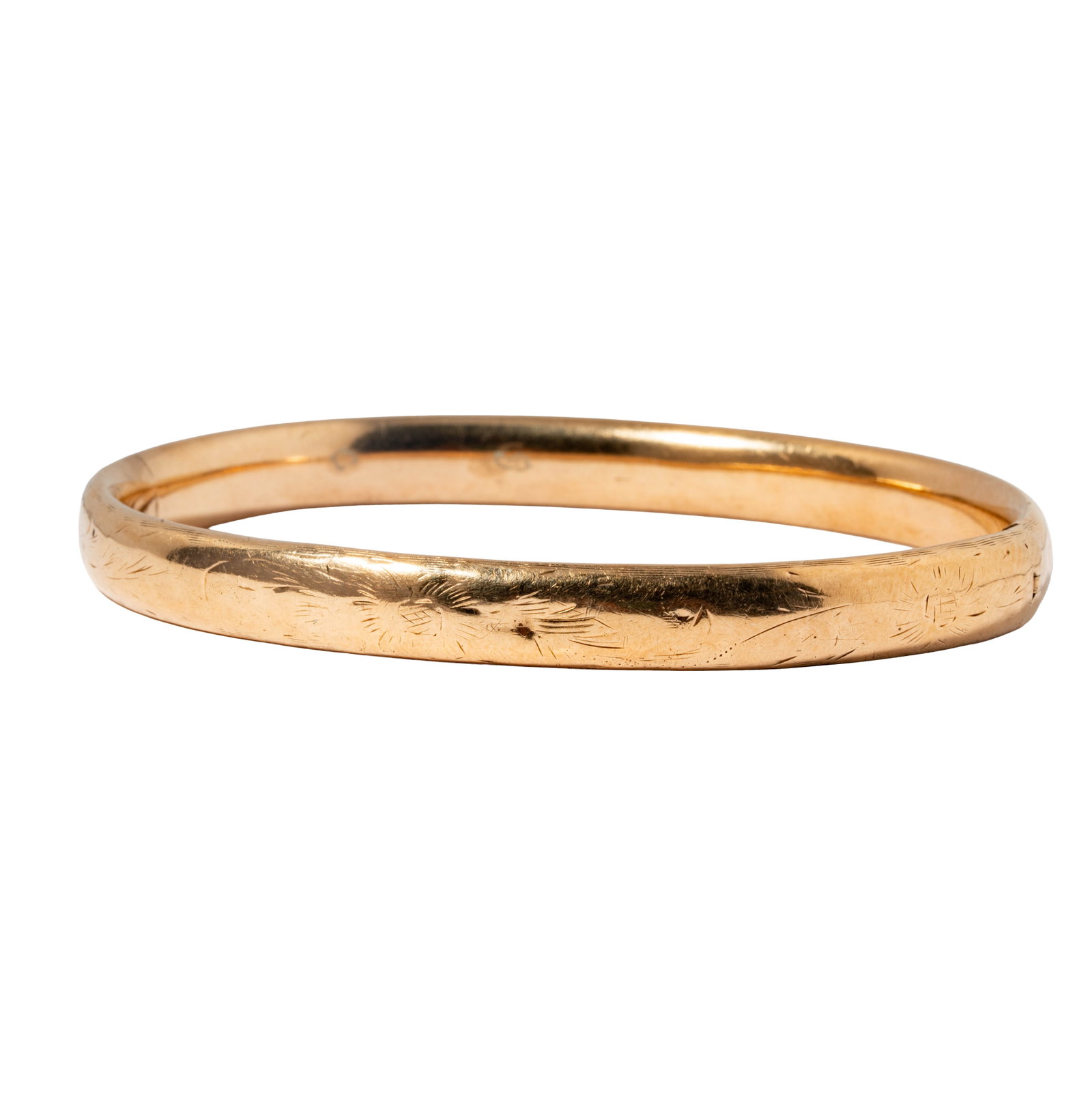 14 Karat Yellow Gold Bangle Bracelet: Including one 14 karat yellow gold bangle bracelet, measuring 8-1/16 inches inside, by 1/4 inches wide weighing 21.1 grams