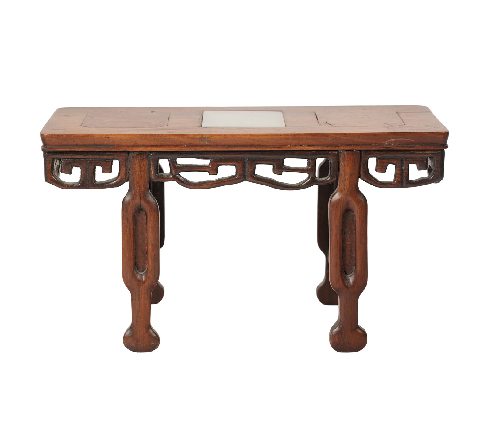 A Diminutive Chinese Altar Table: teak with reticulated apron and stone inset top, likely early 20th century, 4 3/4 x 8 1/4 x 4 in.