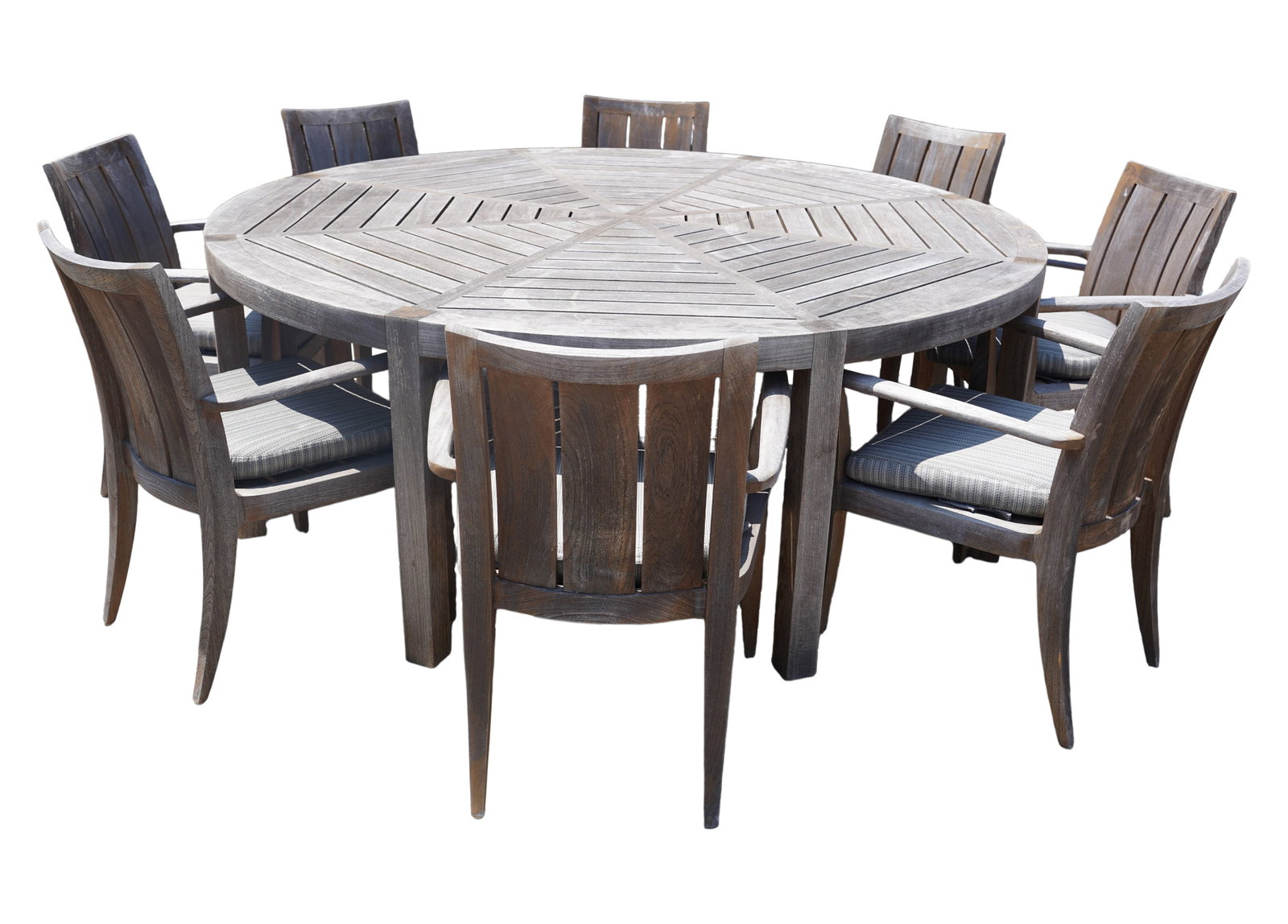 A Summit Teak Round Patio Table and Chairs: comprising: round table (29 1/4 x 79 3/4 in.) eight arm chairs (34 x 25 x 23 in. seat height: 18 1/2 in.)