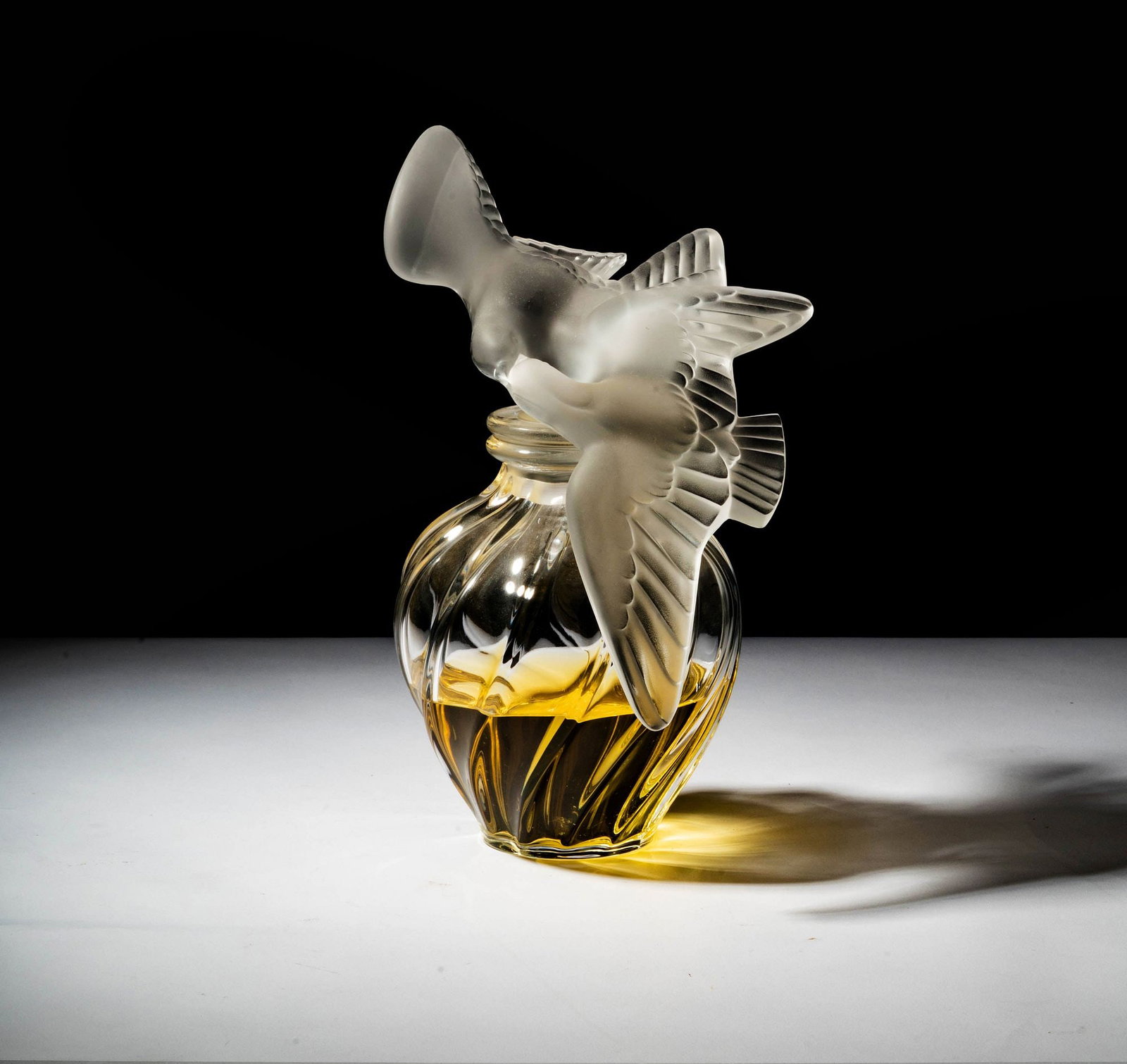 Large Lalique 'Nina Ricci L'Air du Temps' Factice: with sticker label to underside, approximately:12 1/4 x 9 x 7 1/2 in.