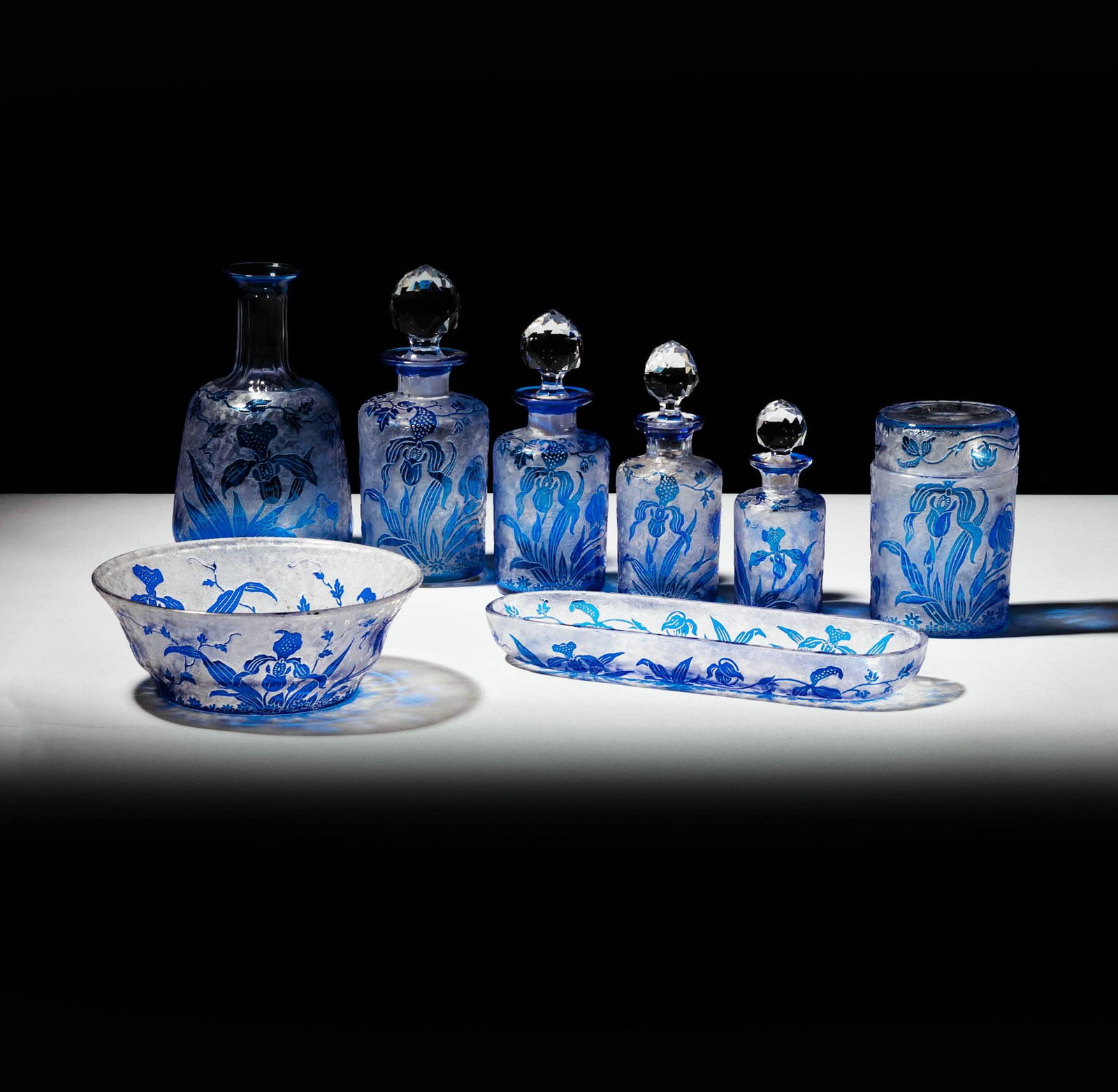 Collection of Val Saint Lambert Art Nouveau-Style Table Articles: comprising a decanter, four bottles, an oblong tray, a covered box, and a bowl, marked to underside, decanter: 7 in. high