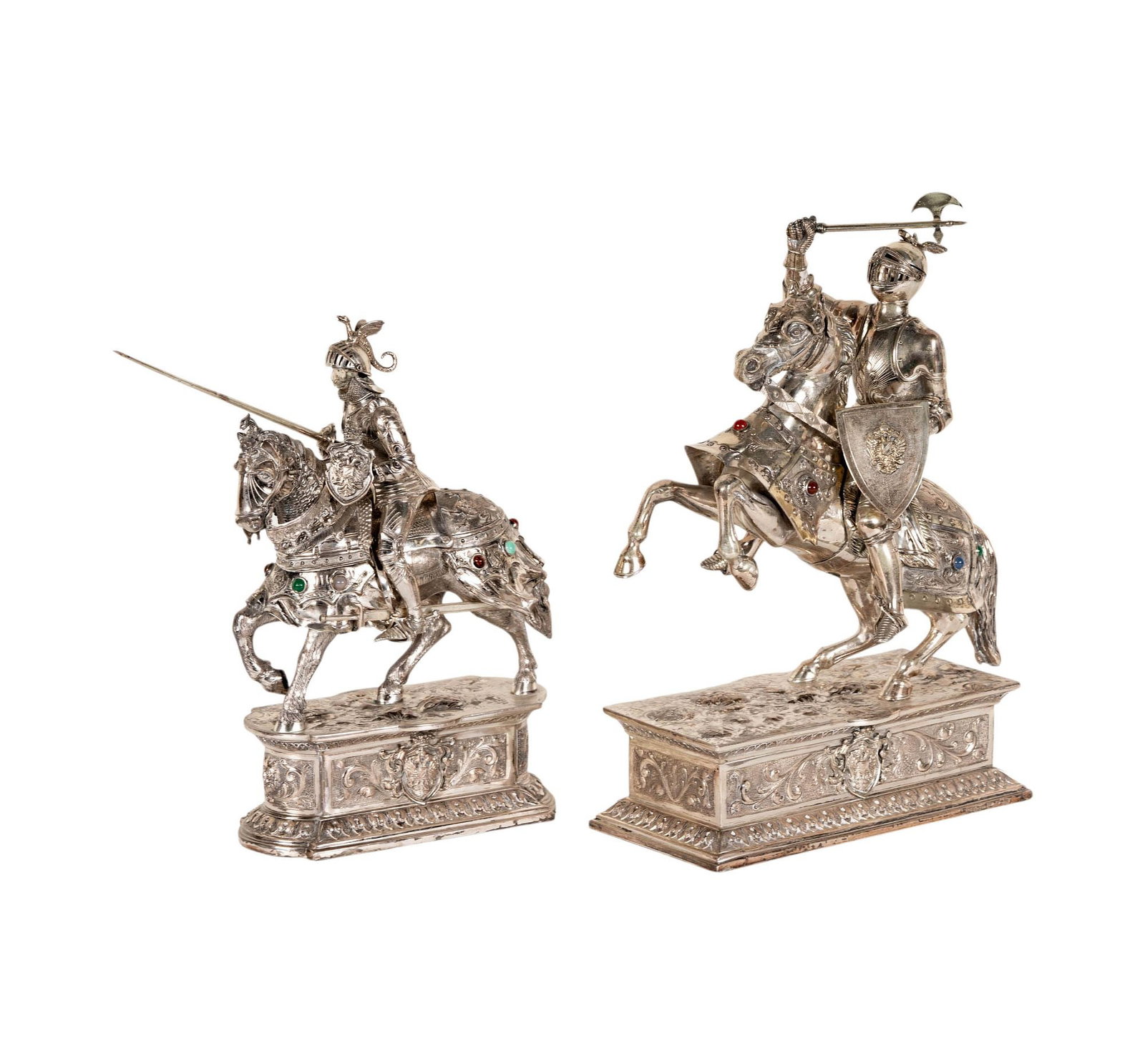 Two German Sterling Silver Knights on Horseback: Hallmarked "Sterling, Germany" along base, Largest: 13 3/4 x 11 1/4, smaller: 12 1/4 x 11 1/2.