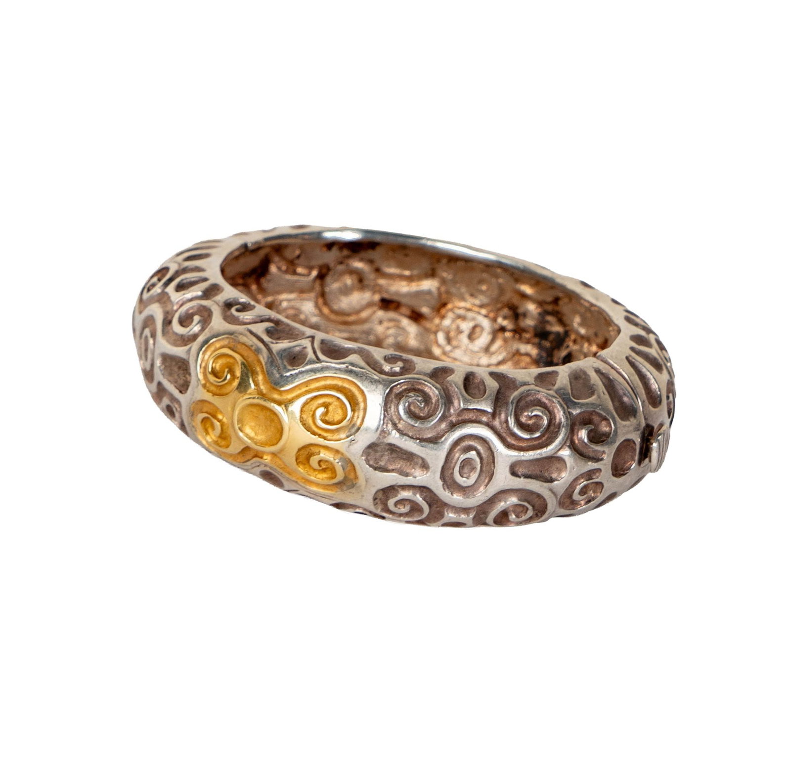 Winc, Sterling Silver, and 18 Karat Yellow Gold Bangle: Including one Winc silver and 18 karat gold bracelet, measuring 6-1/8 inches inside, and weighing 84.9 grams;