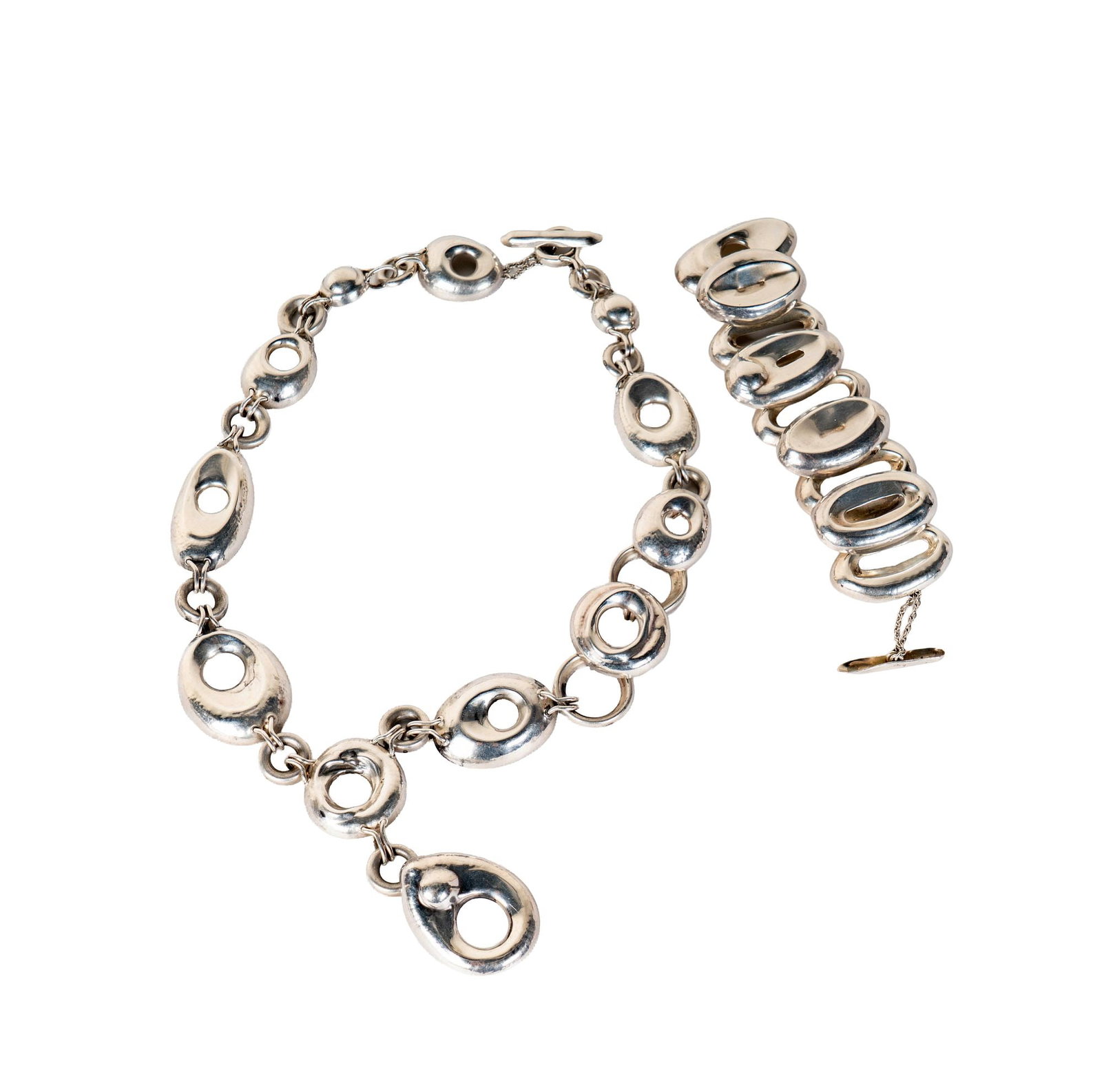 Sterling Necklace and Bracelet: matching pair, necklace measuring 25-1/2 inches long and weighing 139 grams, bracelet measuring 7-3/4 inches long by 1-7/8 inches wide and weighing 70 grams;