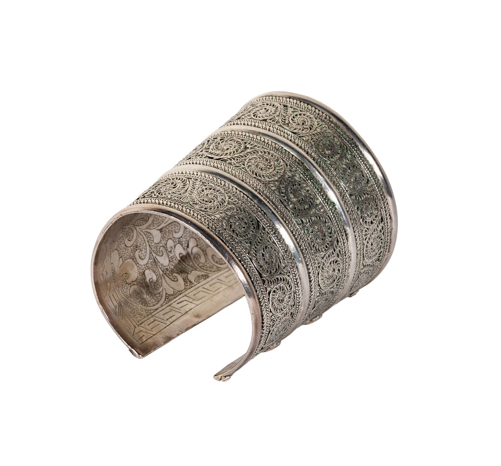 Sterling Cuff Bracelet: Including one engraved sterling cuff, measuring 6-1/8 inches inside and measuring 2-3/4 inches wide, weighing 120 grams;