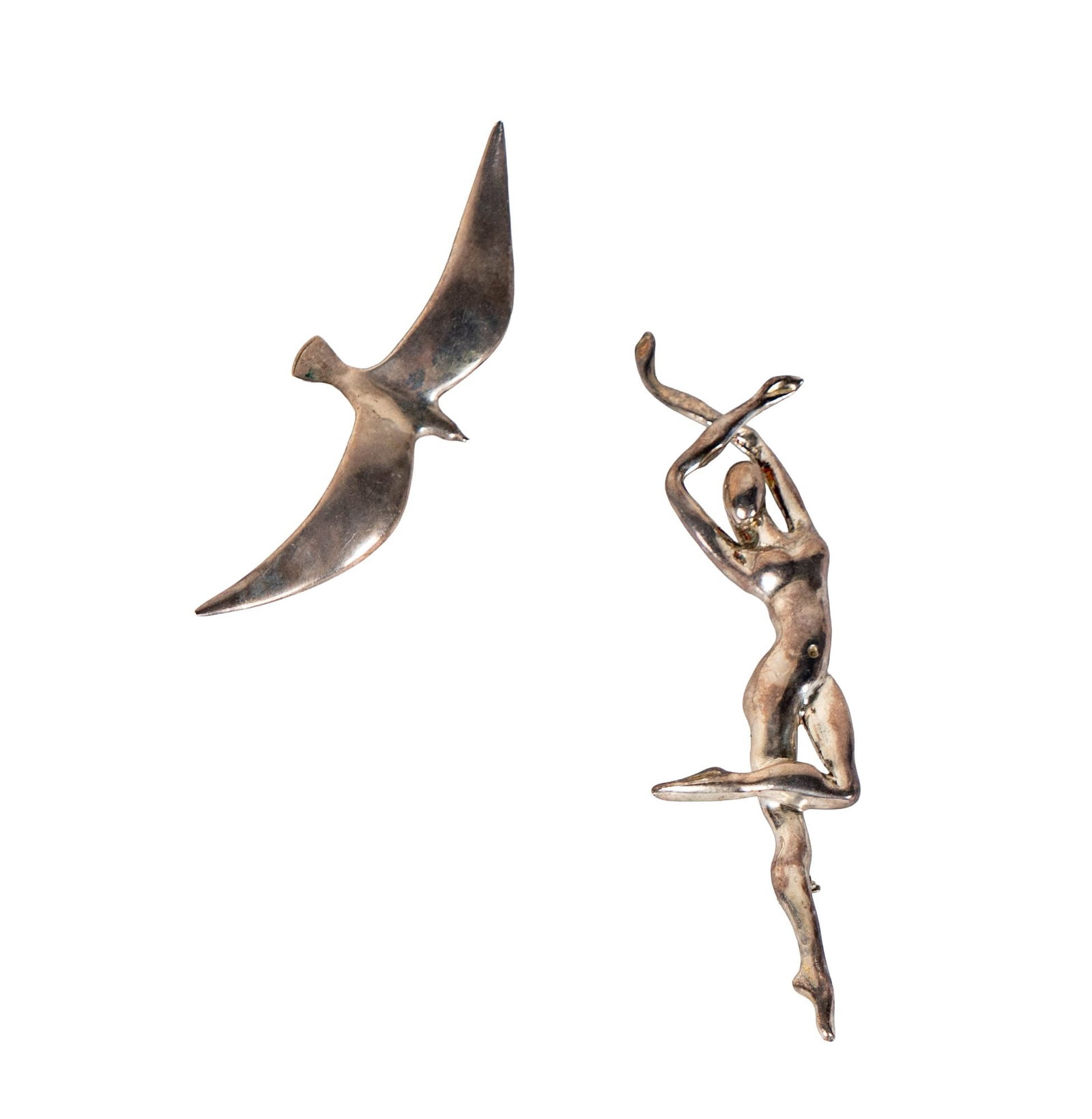 Sterling Dancer Brooch and Bird Brooch: Including two silver brooches, (Dancer pendant/brooch) larger measuring 3-1/2 inches long, together weighing 20 grams;