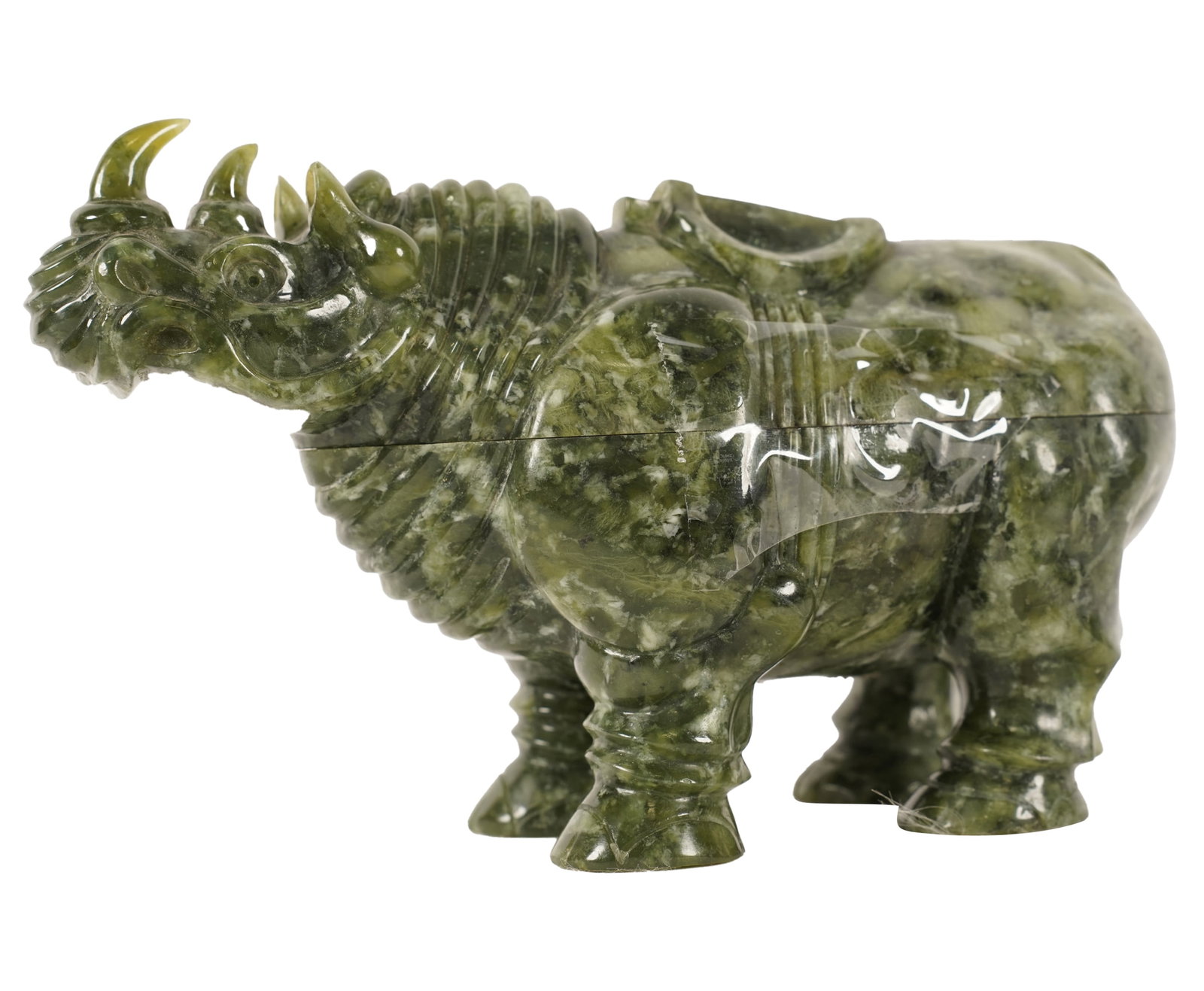 A Carved Green Stone Rhinoceros Box: green striated jade like stone, 5 1/4 x 8 3/4 x 3 1/2 ins.