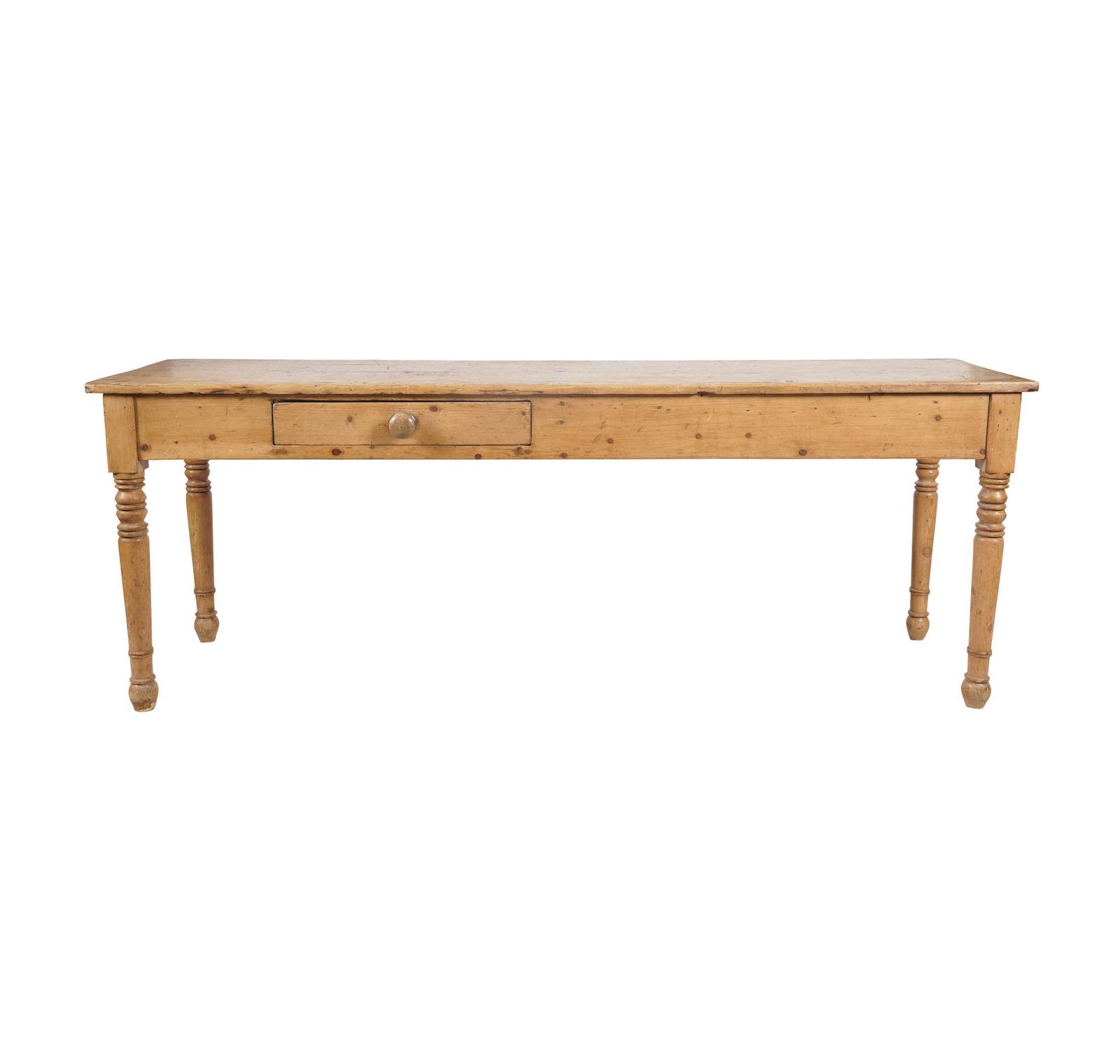 A Pine Harvest Table: Unfinished natural pine on turned wooden legs, with single off-set drawer, late 19th century, 27 h x 72 w x 19 ins.