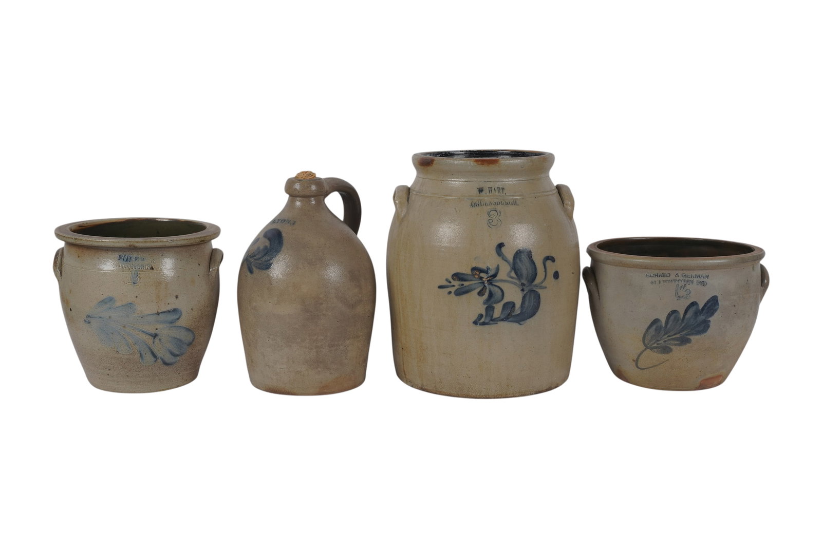 Four Antique Salt Glazed Stoneware Table Articles: 19th century, comprising three crooks and jug, smallest: 7 1/2 in. high, largest: 12 3/4 in. high