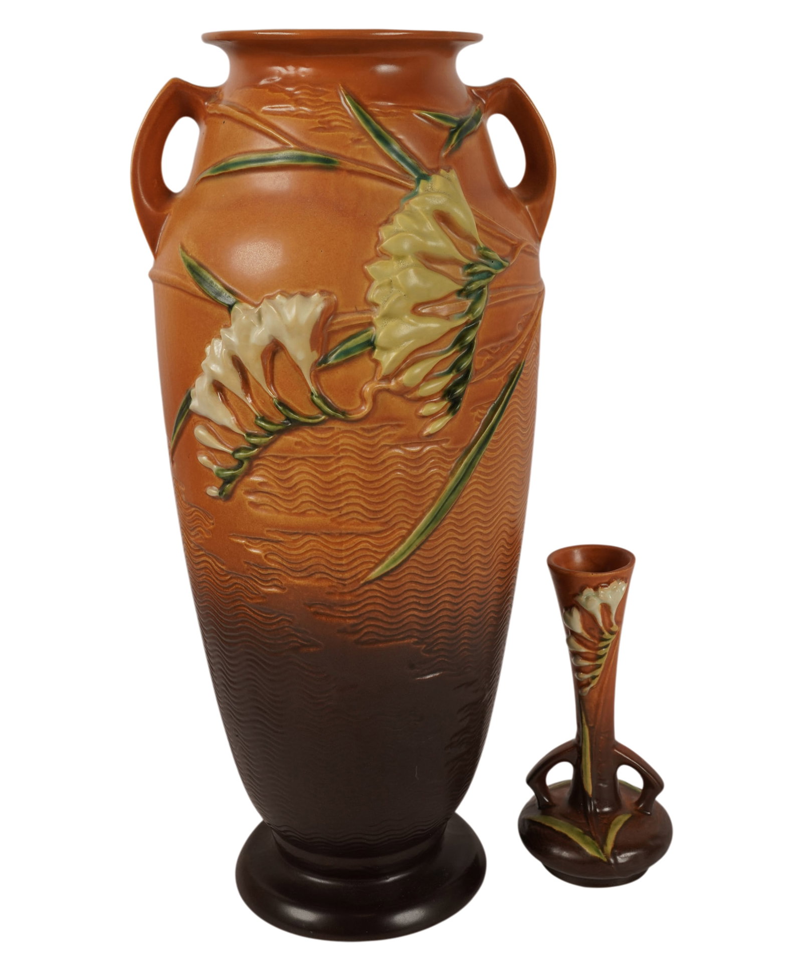 A Large Roseville Fressia Vase and Bud Vase: largest: 18 3/4 x 8 1/2 in., other: 7 1/4 x 3 3/4 in.