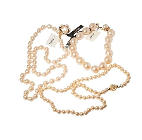 Three Chanel Pearl Costume Necklaces: Buyer's Premium is 25% on Abell.com Buyer's Premium is 28% on Liveauctioneers.com