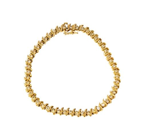 10 Karat Yellow Gold Diamond Bracelet: Buyer's Premium is 25% on Abell.com Buyer's Premium is 28% on Liveauctioneers.com Including one 10 karat yellow gold diamond bracelet set with 49 small round diamonds [L-N/SI2] weighing approximately