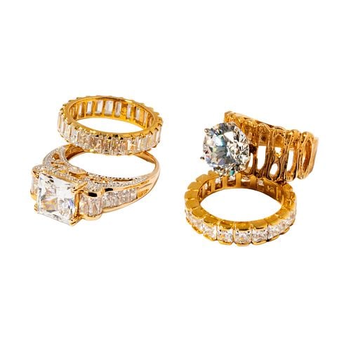 Group of Four 14 Karat Yellow Gold Glass Rings: Buyer's Premium is 25% on Abell.com Buyer's Premium is 28% on Liveauctioneers.com Including a group of four 14 karat yellow gold glass rings, sizes: 5-3/4 to 7; together weighing 18.1 grams;