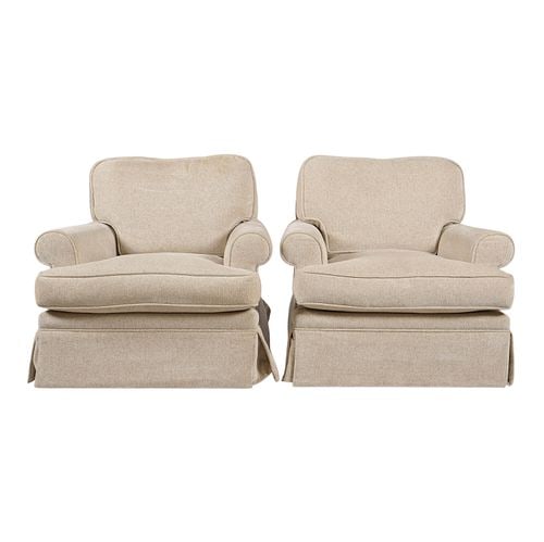 Pair of Beige Upholstered Club Chairs: Buyer's Premium is 25% on Abell.com Buyer's Premium is 28% on Liveauctioneers.com 32 x 42 x 39 in., seat height: 19 in.