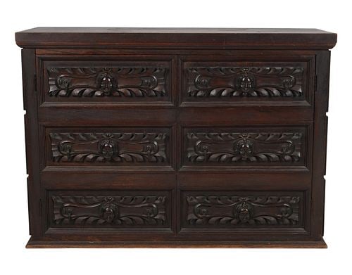Cherub Motif Carved Wood Dresser: Buyer's Premium is 25% on Abell.com Buyer's Premium is 28% on Liveauctioneers.com 35 x 50 x 19 in.