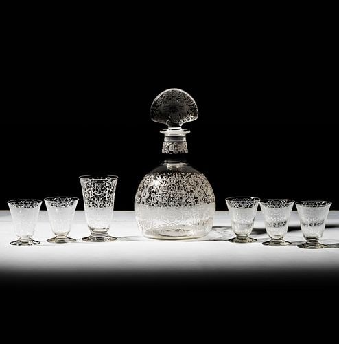 Baccarat Marillon Etched Crystal Drink Set: Buyer's Premium is 25% on Abell.com Buyer's Premium is 28% on Liveauctioneers.com comprising a decanter (9 3/4 in. high), four cups (2 1/2 in. high) and one cup (4 in. high), each marked to underside