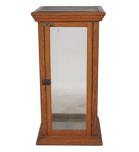 Oak and Glass Showcase: Buyer's Premium is 25% on Abell.com Buyer's Premium is 28% on Liveauctioneers.com 32 x 16 in.