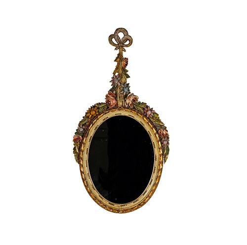 Carved and Painted Wood Oval Wall Mirror: Buyer's Premium is 25% on Abell.com Buyer's Premium is 28% on Liveauctioneers.com overall: 35 x 13 1/4 in., mirror plate: 16 3/4 x 12 1/2 in.