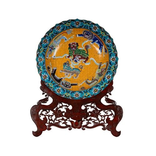 Chinese Cloisonne Charger on Carved Wood Stand: Buyer's Premium is 25% on Abell.com Buyer's Premium is 28% on Liveauctioneers.com 21 in. dia., overall: 30 1/2 in. high
