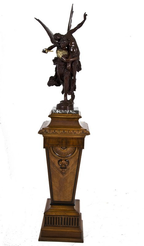 GLORIA VICTIS: after the model by Antonin Mercie bronze group with parcel gilding inscribed in casting with a tapered wood pedestal 34 1/2 inches high; 78 1/2 total inches high