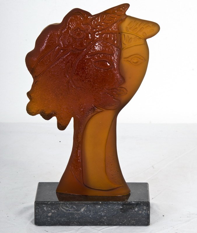 AFTER GEORGE BRAQUE: "PERSEPHATA": molded Daum amber glass bust on a gray marble plinth signed, stamped, and numbered 24/150 on neck Provenance: Estate of David Copley, La Jolla 13 1/2 total inches high