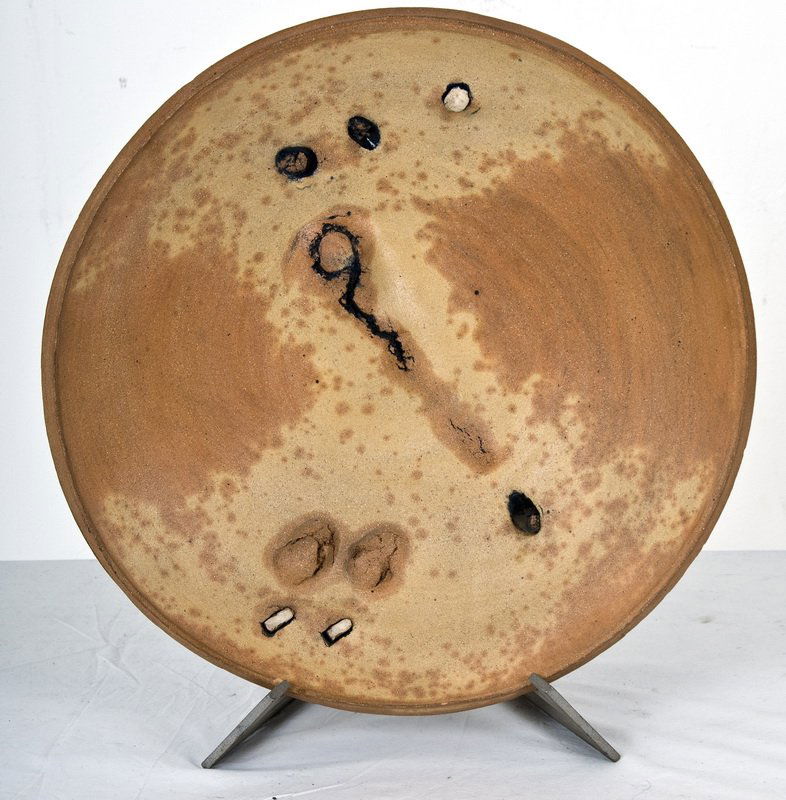 PETER VOULKOS: SCULPTURED CERAMIC PLATE: with custom metal stand Provenance: Primus Gallery, Los Angeles 18 3/4 inches