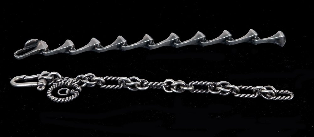 TWO GUCCI SILVER BRACELETS: two assorted heavy chain bracelets; marked "925" silver 5.8 troy ounces 9 inches long