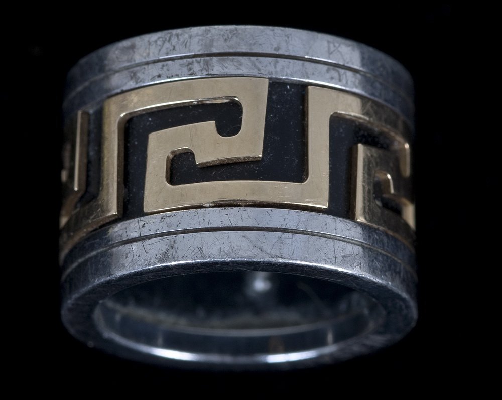 VERSACE SILVER & GOLD GREEK-KEY BAND RING: with a leather inset band 13 grams (8.3 dwts) size 8